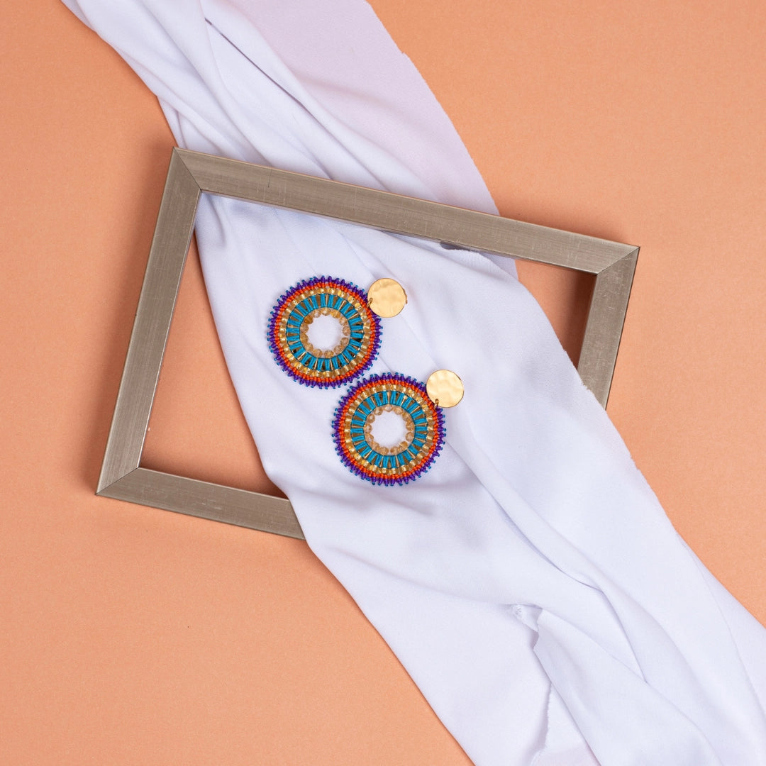 Arete amanecer naranja morado