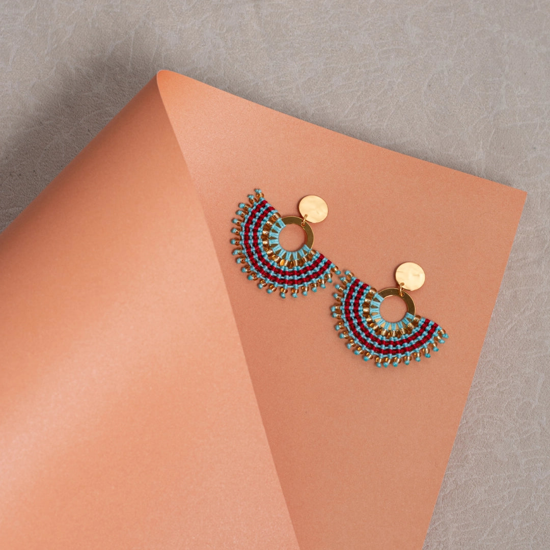 Arete media luna cielo rojo